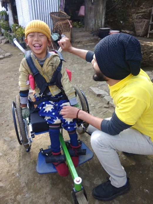 Happy child after getting wheelchair support